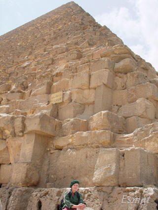 Image of North East corner of Great Pyramid with Colette Dowell photo by Esmat